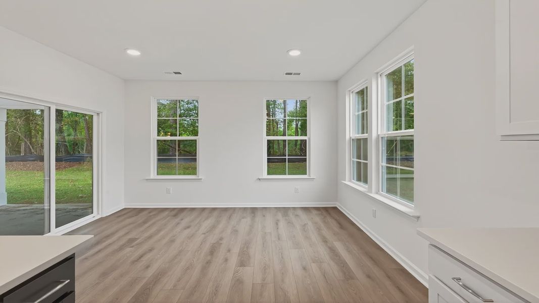 Furnished interior view inside a new home in Creekside at Andrews, Summerville (Image 9). Furnished interior view inside a new home in Creekside at Andrews, Summerville (Image 9).