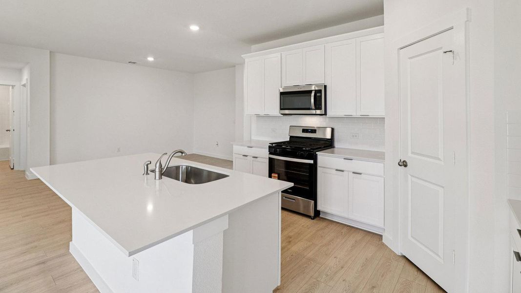 Furnished interior view inside a new home in Monarch Ranch, Manor (Image 8).