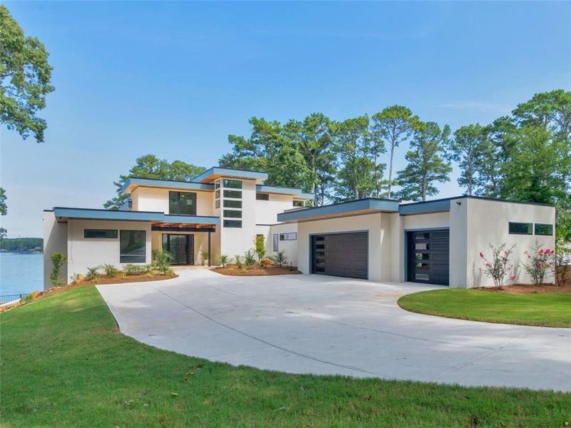 Front exterior of a new home in , Jonesboro, GA, highlighting curb appeal (Image 27).