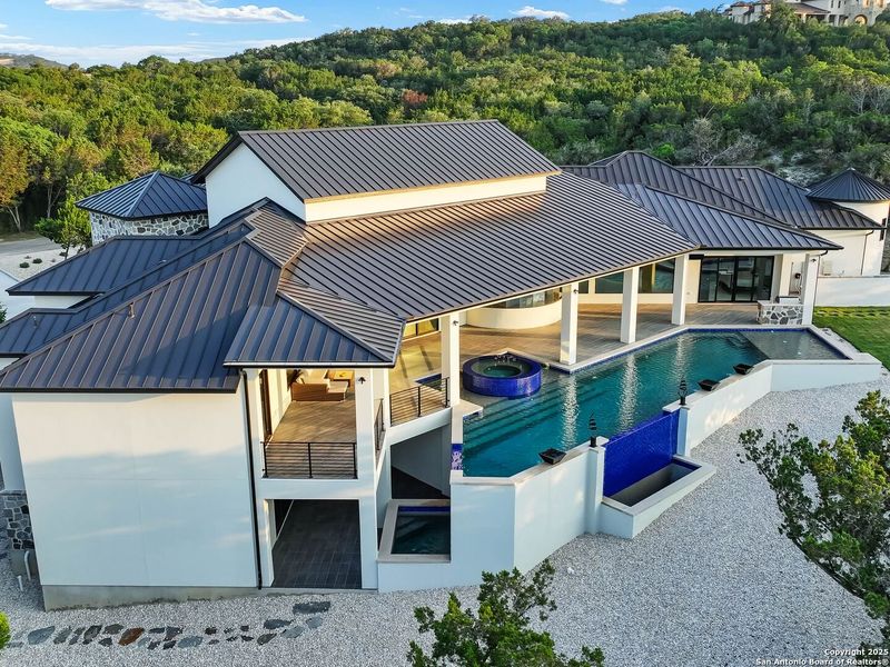 Front exterior of a new home in , Boerne, TX, highlighting curb appeal (Image 21). Front exterior of a new home in , Boerne, TX, highlighting curb appeal (Image 21).