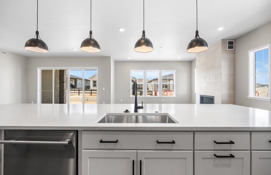 Furnished interior view inside a new home in Hilltop at Inspiration, Aurora (Image 15).