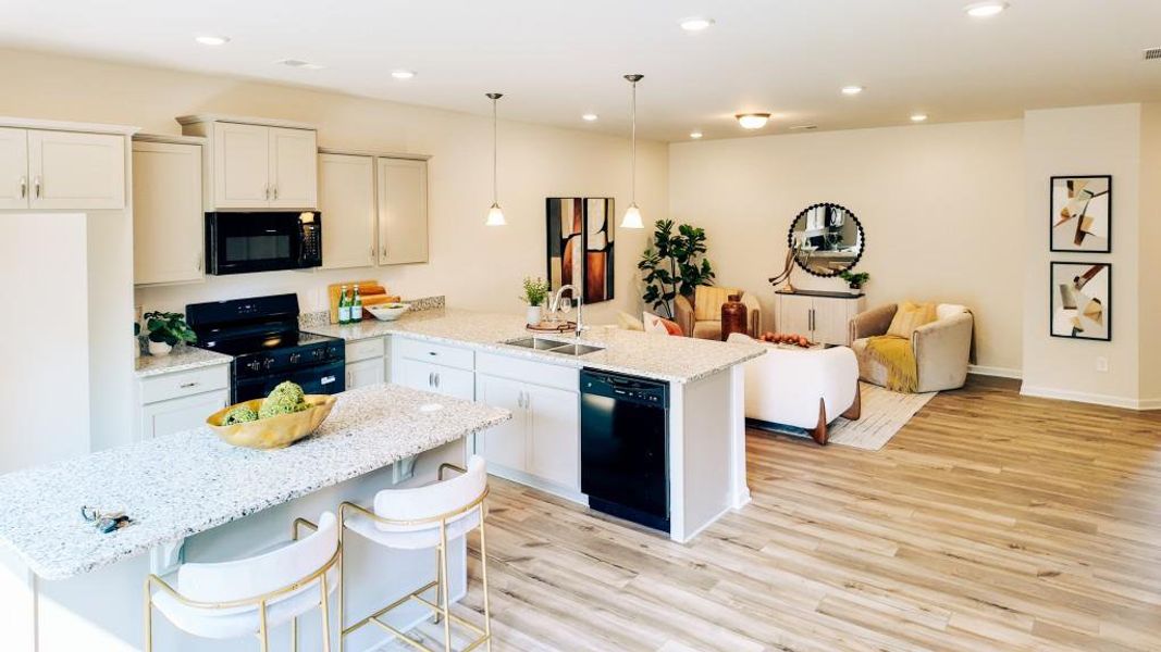 Furnished interior view inside a new home in Sterling At The Villages, Calhoun (Image 6).