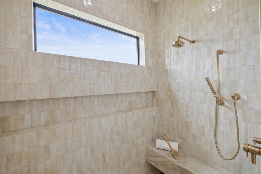 Full bathroom with a tile shower Full bathroom with a tile shower