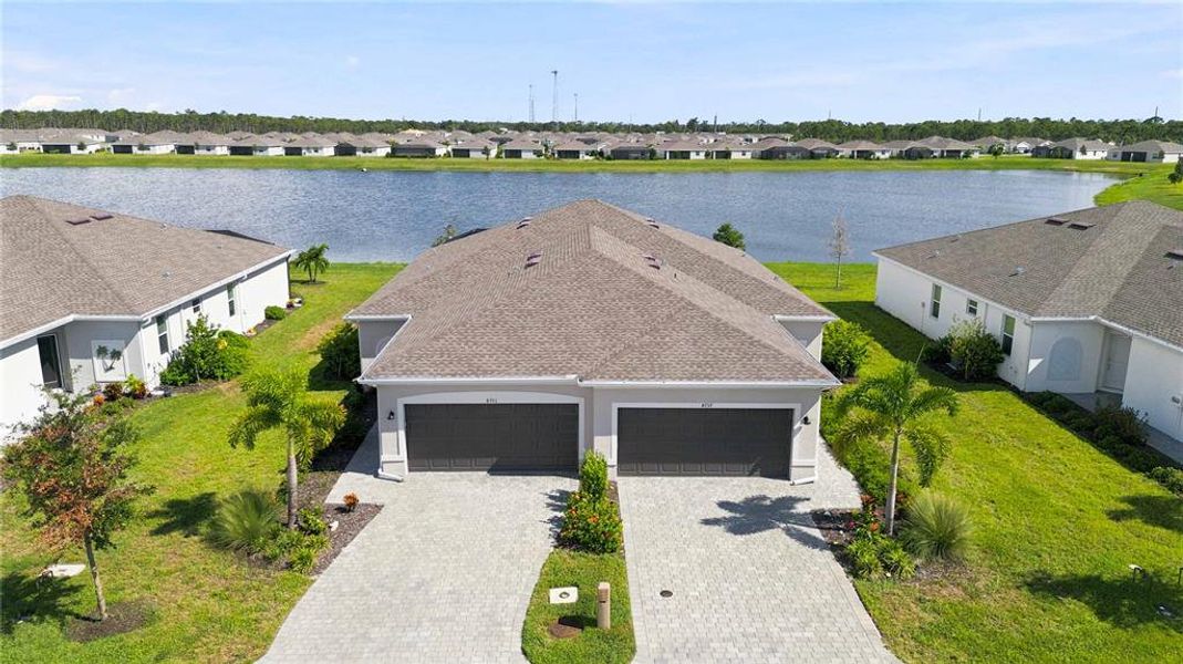 Front exterior of a new home in , Englewood, FL, highlighting curb appeal (Image 25). Front exterior of a new home in , Englewood, FL, highlighting curb appeal (Image 25).