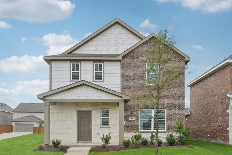 Representative exterior photo of a completed home built from the Saturn by Starlight Homes in Brookshire at Legacy Hills, Celina, TX (Image 1). Representative exterior photo of a completed home built from the Saturn by Starlight Homes in Brookshire at Legacy Hills, Celina, TX (Image 1).