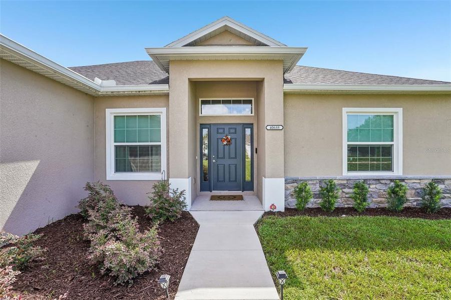 Exterior details and patio area of a home in , Umatilla (Image 30).