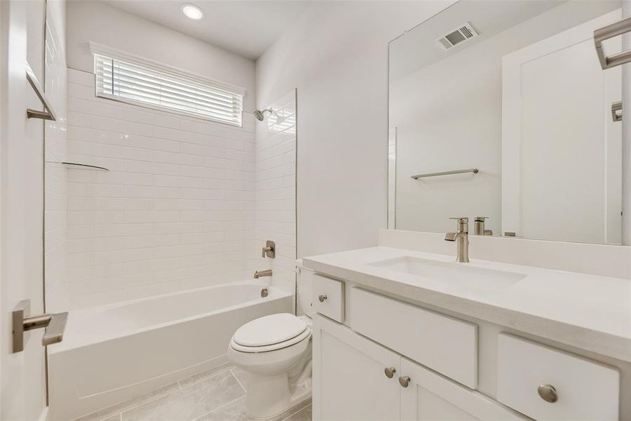 Furnished interior view inside a new home in Collin Creek, Plano (Image 8).