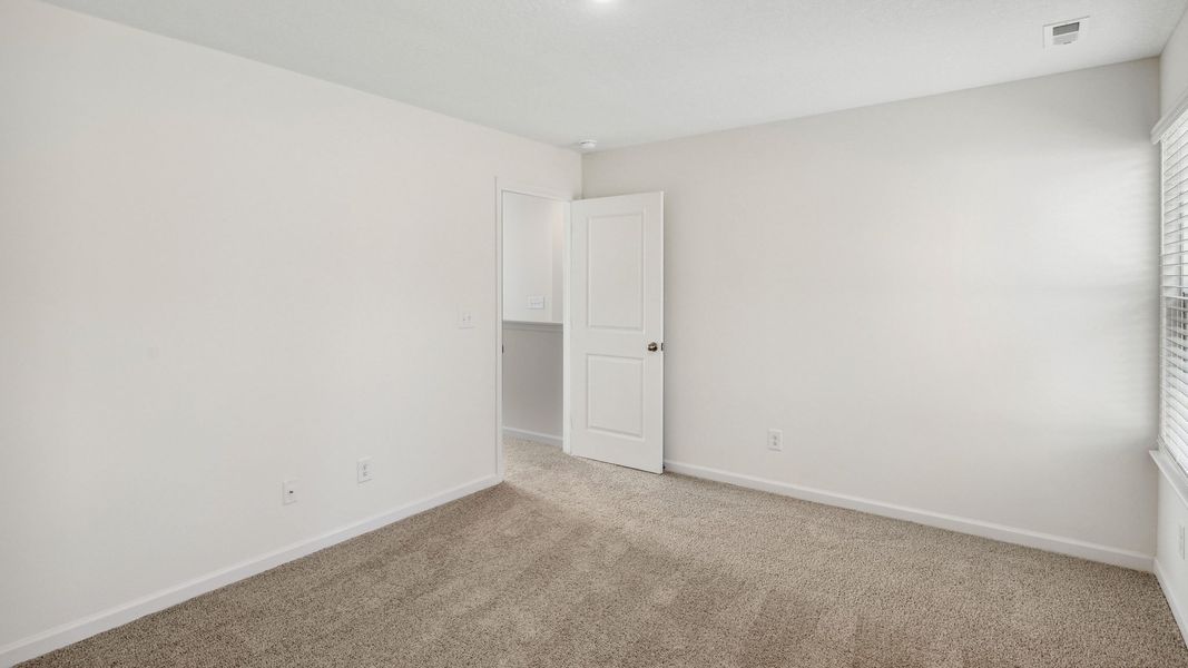 Spacious, unfurnished interior of a new home in The Hideaway at Fox Meadows, Bluff City (Image 20).
