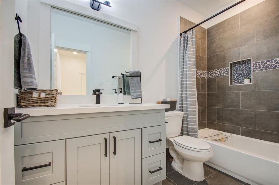 Ensuite full bathroom on the third floor! Photos from another community by the same builder, FINISHES & FLOOR PLAN WILL VARY!