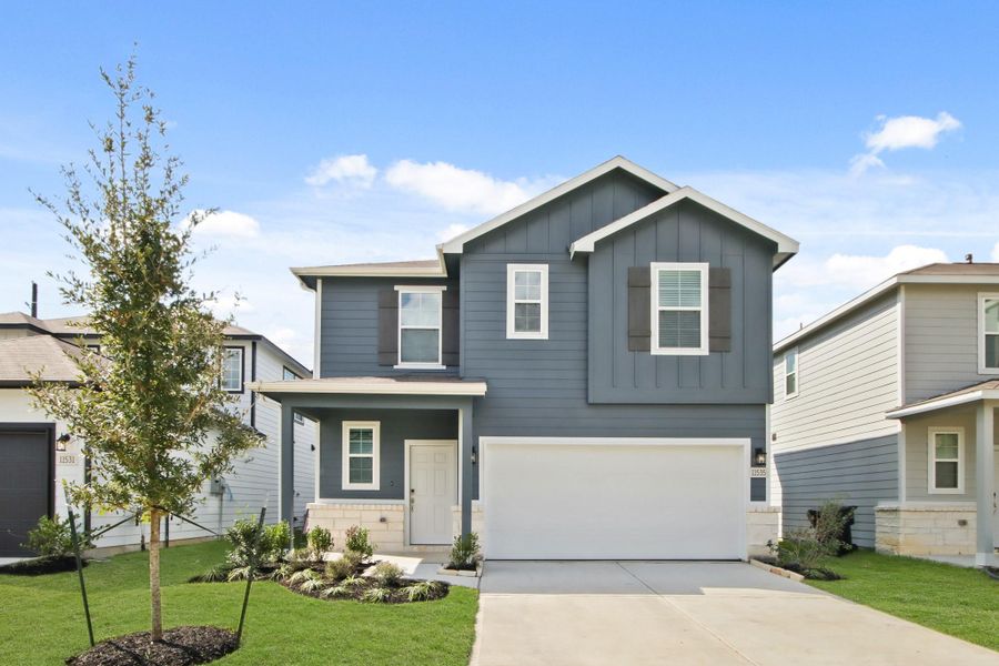 Front exterior of a new home in Barrett Crossing, Crosby, TX, highlighting curb appeal (Image 1). Front exterior of a new home in Barrett Crossing, Crosby, TX, highlighting curb appeal (Image 1).