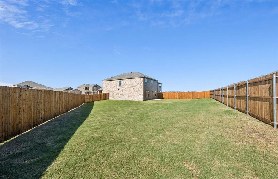 Spacious, fenced-in backyard