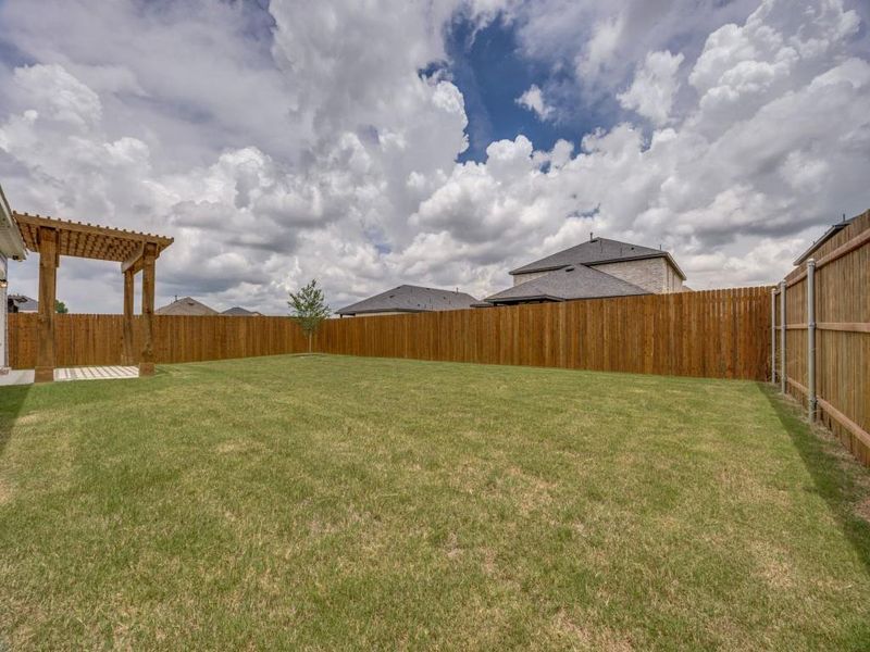Exterior details and patio area of a home in Pebblebrook, Sherman (Image 13).