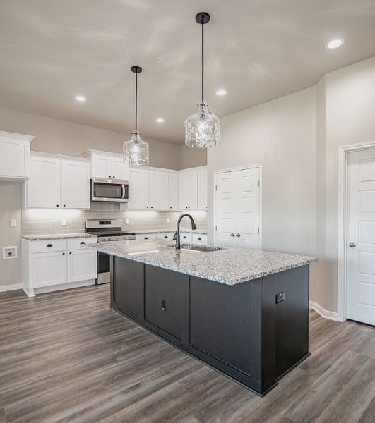 Representative furnished interior of a home built from the Salado by Steve Klein Custom Builder in TerraVista, Victoria (Image 5).
