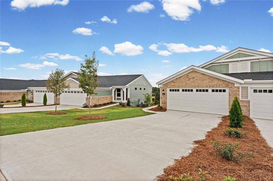 Front exterior of a new home in Villas at Gold Creek, Dawsonville, GA, highlighting curb appeal (Image 18).