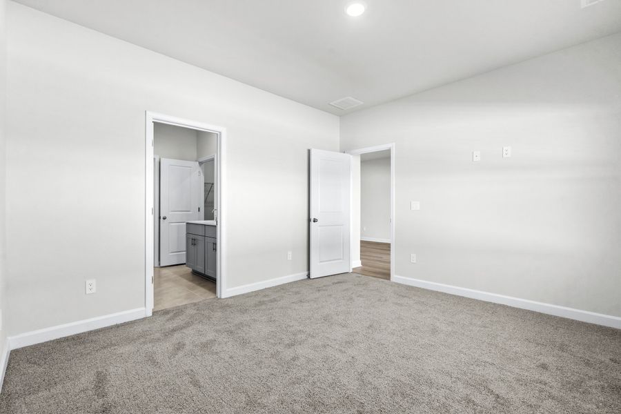 Spacious, unfurnished interior of a new home in Cypress Ridge - The Boardwalk Series, Longs (Image 22).