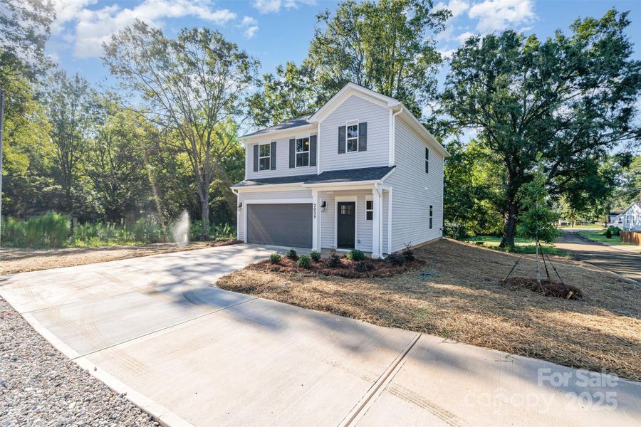 Front exterior of a new home in , Gastonia, NC, highlighting curb appeal (Image 1). Front exterior of a new home in , Gastonia, NC, highlighting curb appeal (Image 1).