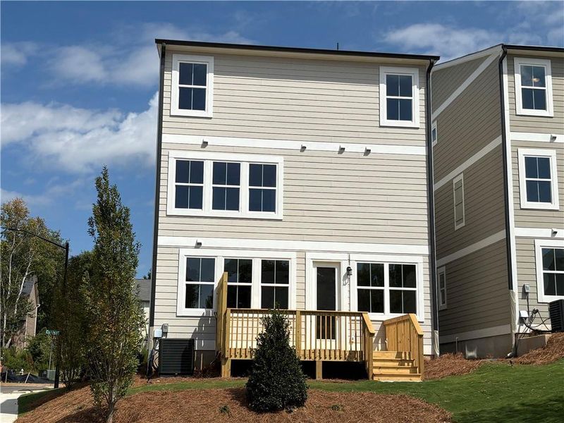 Front exterior of a new home in , Marietta, GA, highlighting curb appeal (Image 2).