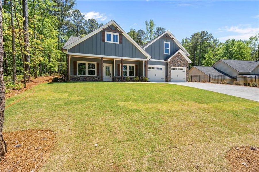 Front exterior of a new home in , Villa Rica, GA, highlighting curb appeal (Image 25).