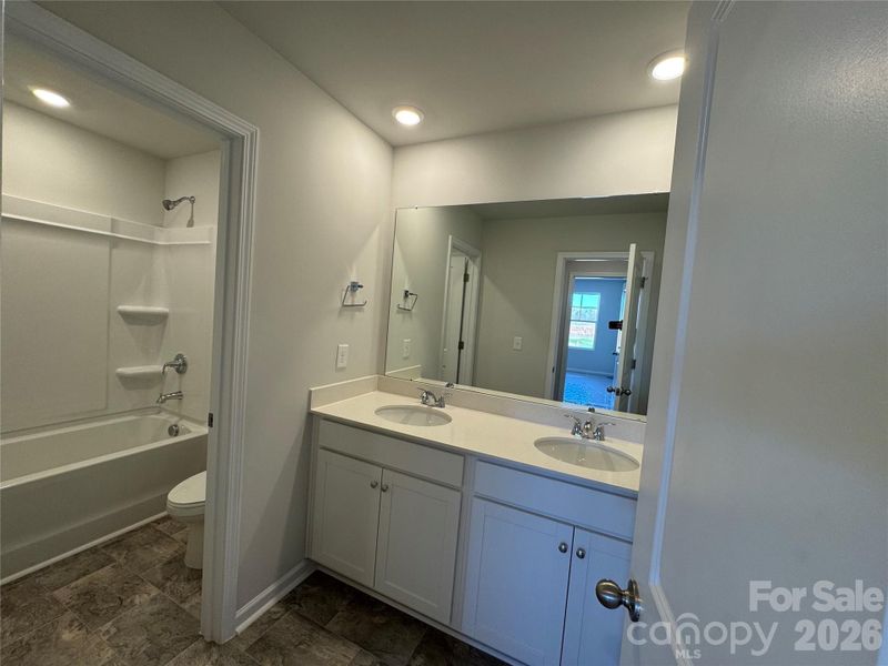 Furnished interior view inside a new home in McFarland Estates, York (Image 11).