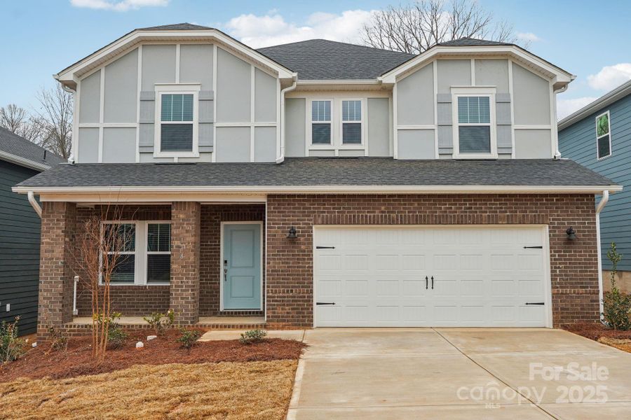 Front exterior of a new home in Harper Landing, Stanley, NC, highlighting curb appeal (Image 1).