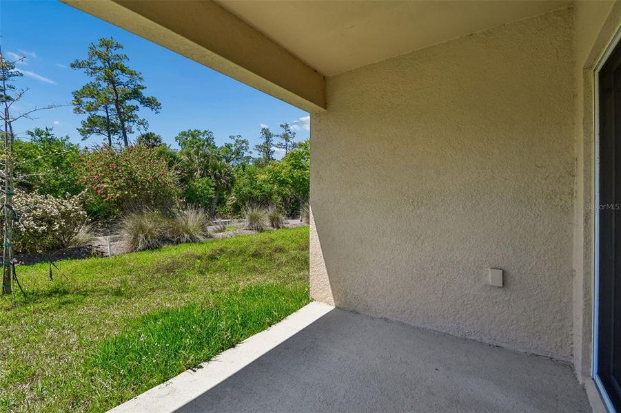 Exterior details and patio area of a home in Riviera Bella, Debary (Image 27).