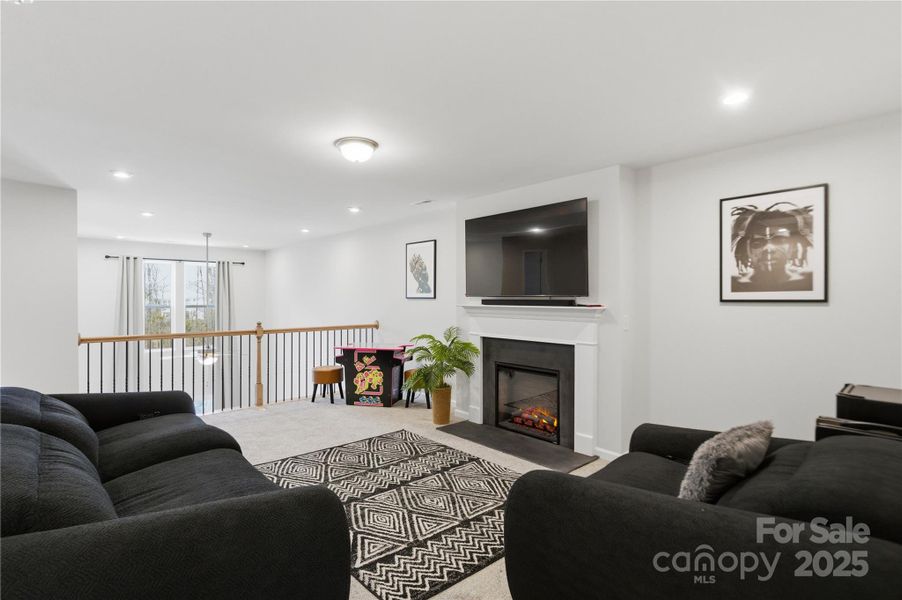 Loft with electric fireplace