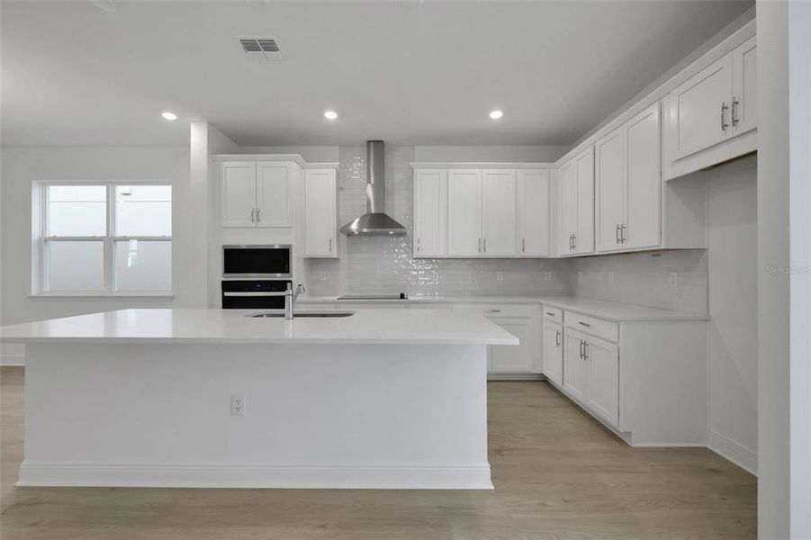 Furnished interior view inside a new home in Crossroads at Kelly Park, Apopka (Image 9). Furnished interior view inside a new home in Crossroads at Kelly Park, Apopka (Image 9).