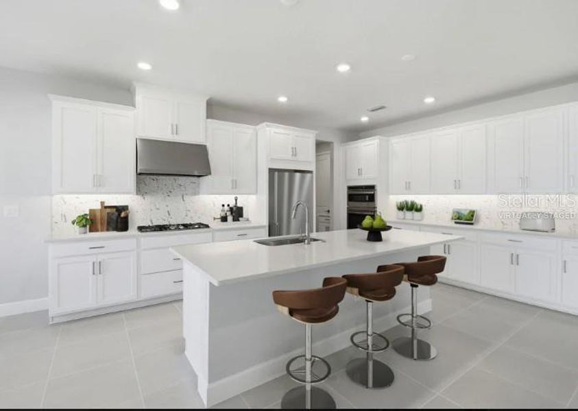 Furnished interior view inside a new home in Harvest at Ovation, Winter Garden (Image 7).