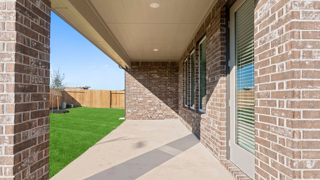 Exterior details and patio area of a home in Alexander, Pearland (Image 2).