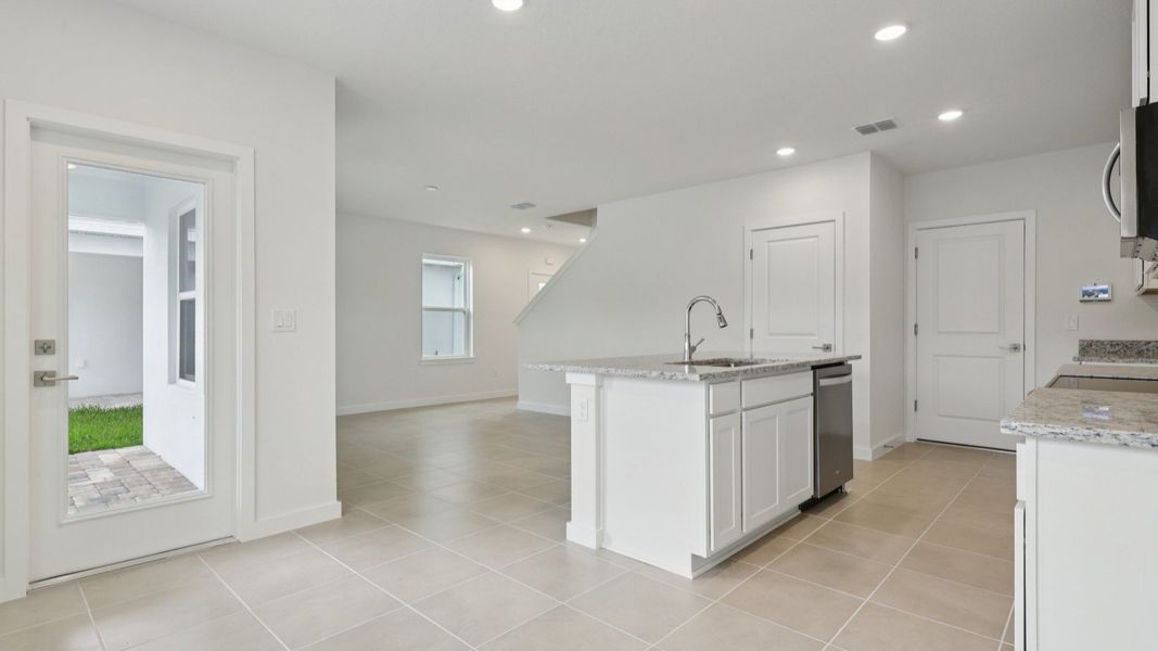 Kitchen of the Coronado - End at Cyrene at Harmony located in St Cloud FL by DRB Homes Kitchen of the Coronado - End at Cyrene at Harmony located in St Cloud FL by DRB Homes