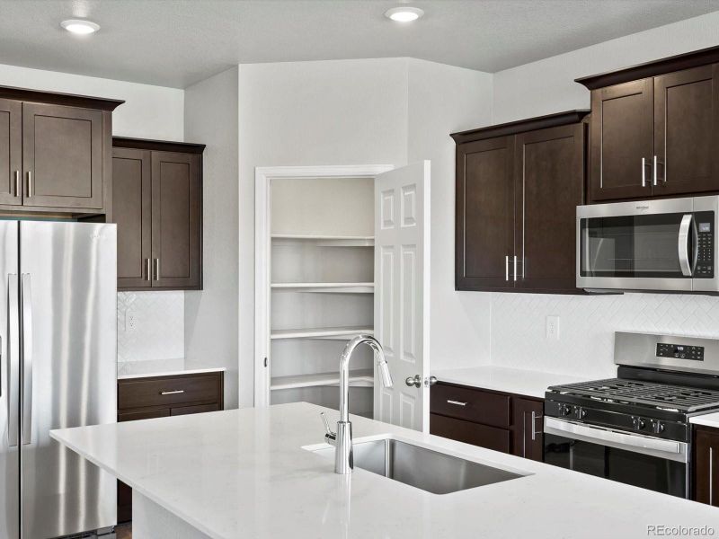 Furnished interior view inside a new home in Poudre Heights: The Lakes Collection, Windsor (Image 5).