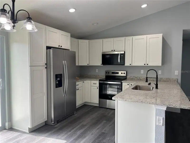 Furnished interior view inside a new home in , Ocala (Image 3).