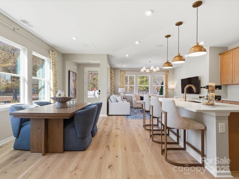 Perfectly Blended Kitchen and Dinning. *Model Photos | Actual Finishes, Structural Selections, and Orientation May Vary.