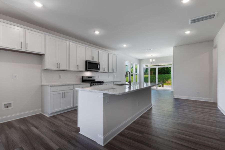 Furnished interior view inside a new home in Enclave at Traditions Townhomes, Wake Forest (Image 7).
