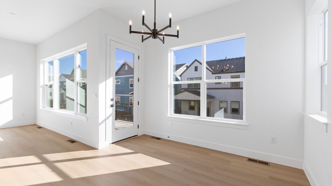 Furnished interior view inside a new home in Dillon Pointe - Journey, Broomfield (Image 19).