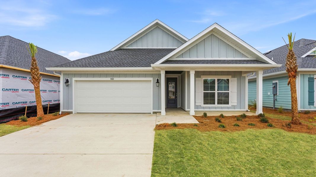 Front exterior of a new home in Breakfast Point East Phase II, Panama City Beach, FL, highlighting curb appeal (Image 1). Front exterior of a new home in Breakfast Point East Phase II, Panama City Beach, FL, highlighting curb appeal (Image 1).