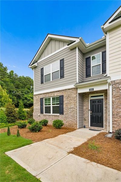 Front exterior of a new home in , Lawrenceville, GA, highlighting curb appeal (Image 25). Front exterior of a new home in , Lawrenceville, GA, highlighting curb appeal (Image 25).
