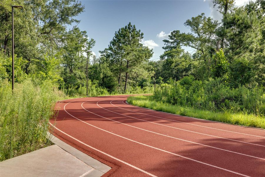 Memorial Park in Houston is a 1,500-acre urban park offering walking and running trails, picnic areas, a golf course, and the Clay Family Eastern Glades for relaxation. It is one of the largest municipal parks in the U.S., located near downtown, and features abundant green spaces and a variety of wildlife. While general access is free, certain facilities like the golf course and swimming pool have separate fees.