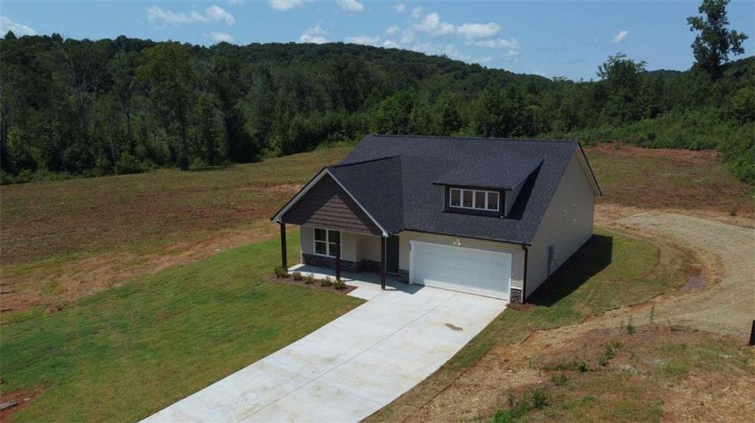 Front exterior of a new home in , Eastanollee, GA, highlighting curb appeal (Image 17).