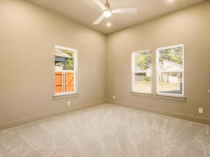 3rd Bedroom with carpet and a ceiling fan