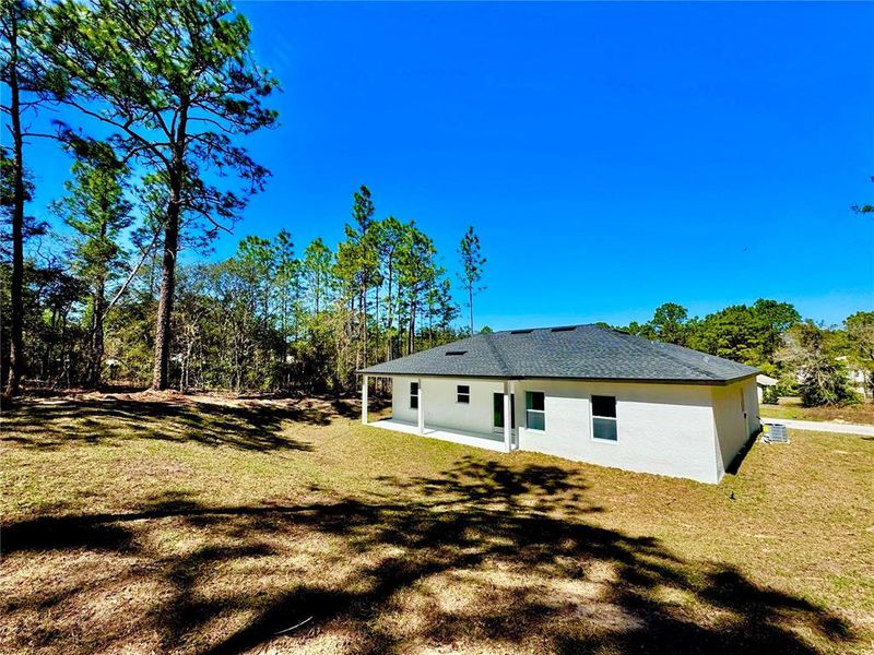 Front exterior of a new home in , Citrus Springs, FL, highlighting curb appeal (Image 12).