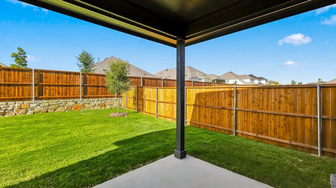 Exterior details and patio area of a home in Anna Ranch, Anna (Image 21). Exterior details and patio area of a home in Anna Ranch, Anna (Image 21).