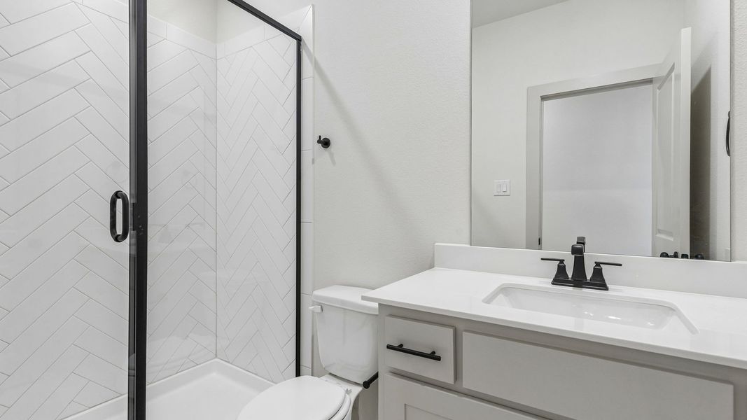 Representative furnished interior of a home built from the Toulouse II by Normandy Homes in Rainwater Crossing, Celina (Image 4).