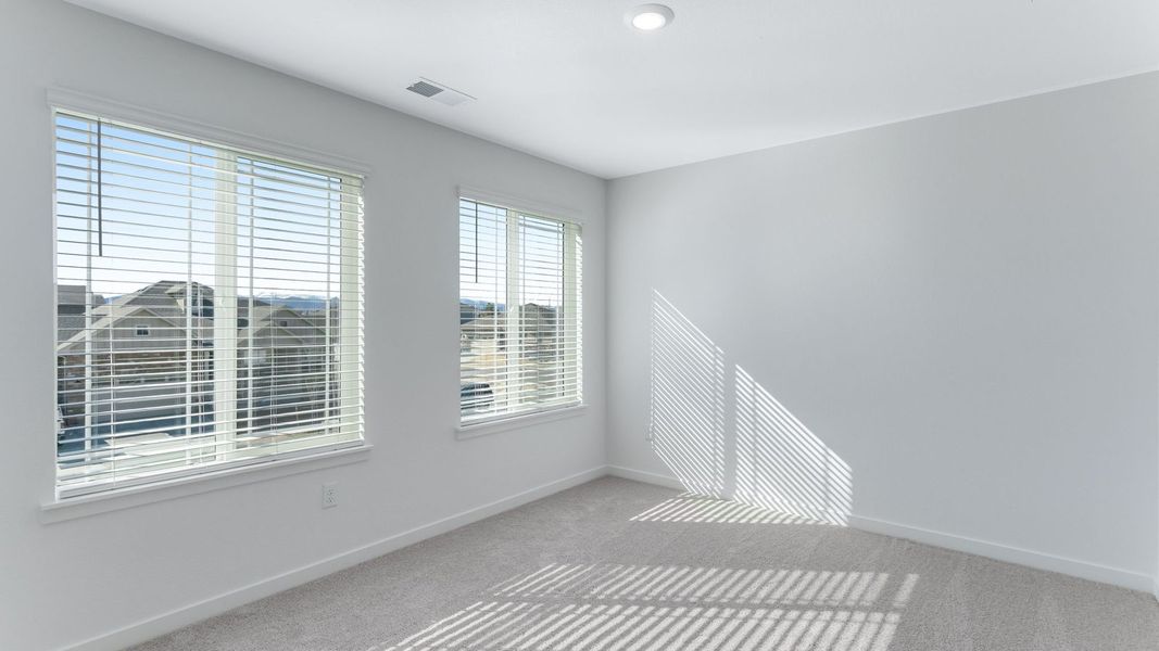 Representative unfurnished interior of a home built from the Calhan by D.R. Horton in Vantage, Berthoud (Image 25).