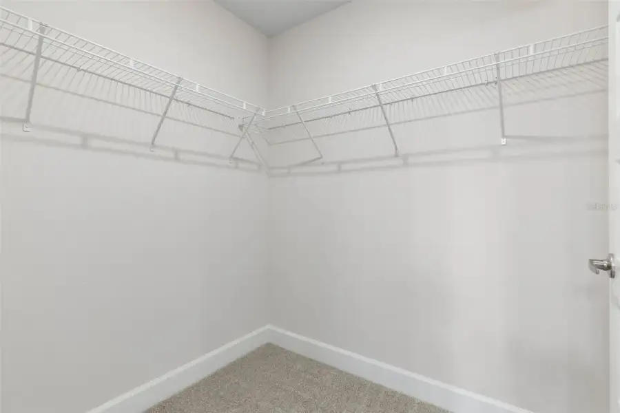 Representative unfurnished interior of a home built from the 2117 by Adams Homes in Flagler Estates, Hastings (Image 27).
