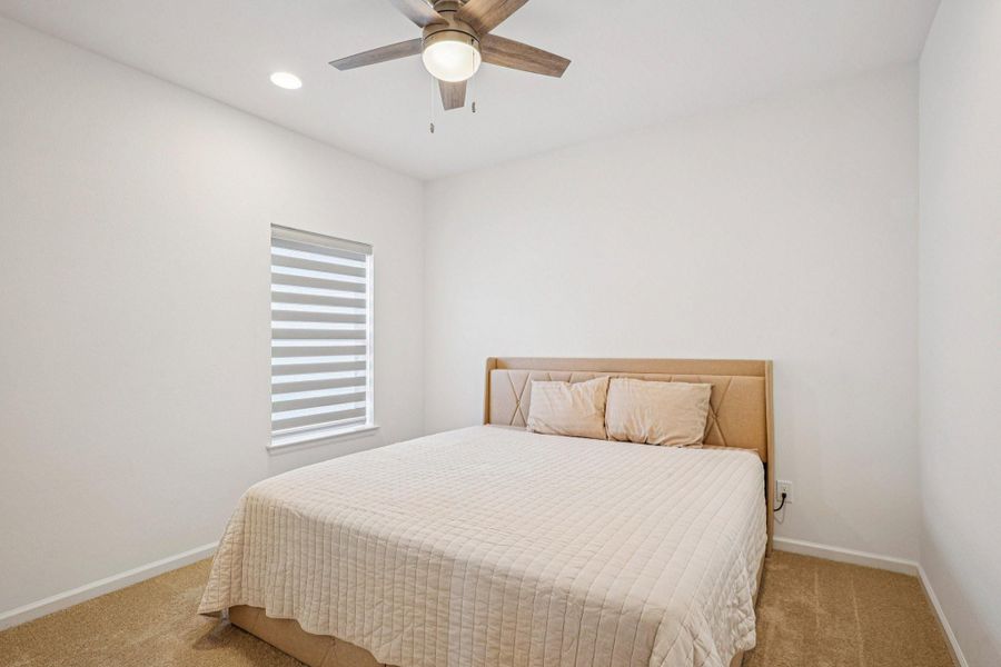 Furnished interior view inside a new home in Sienna, Missouri City (Image 35).