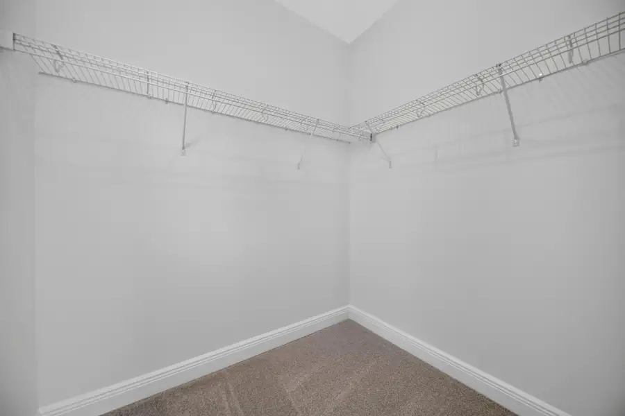 Spacious, unfurnished interior of a new home in Lake Cawood Cove, Windermere (Image 19).