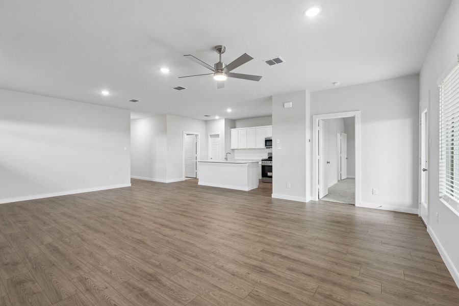 Open Floor Plan in the Oscar home plan by Trophy Signature Homes – REPRESENTATIVE PHOTO