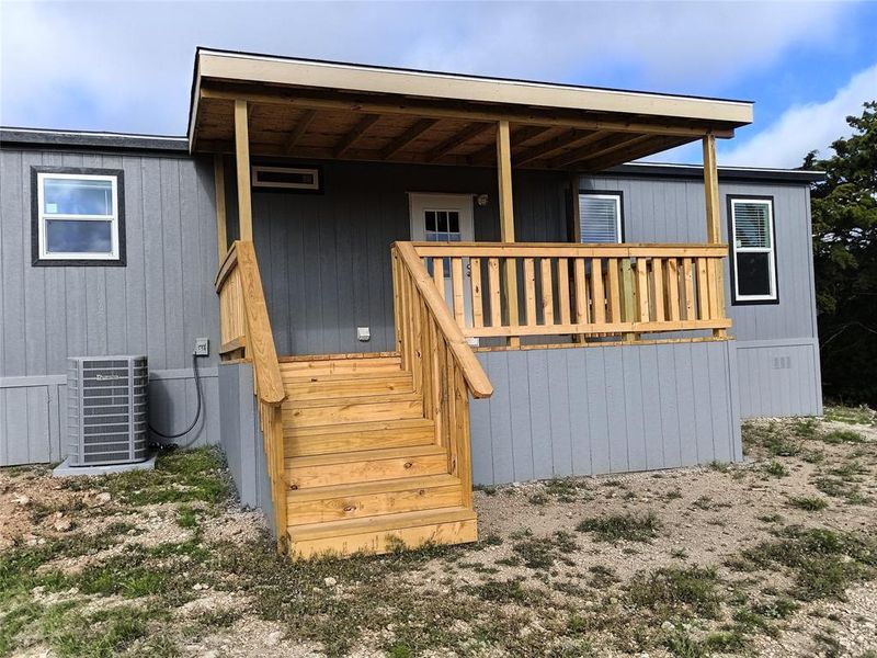 Exterior details and patio area of a home in , Springtown (Image 9).