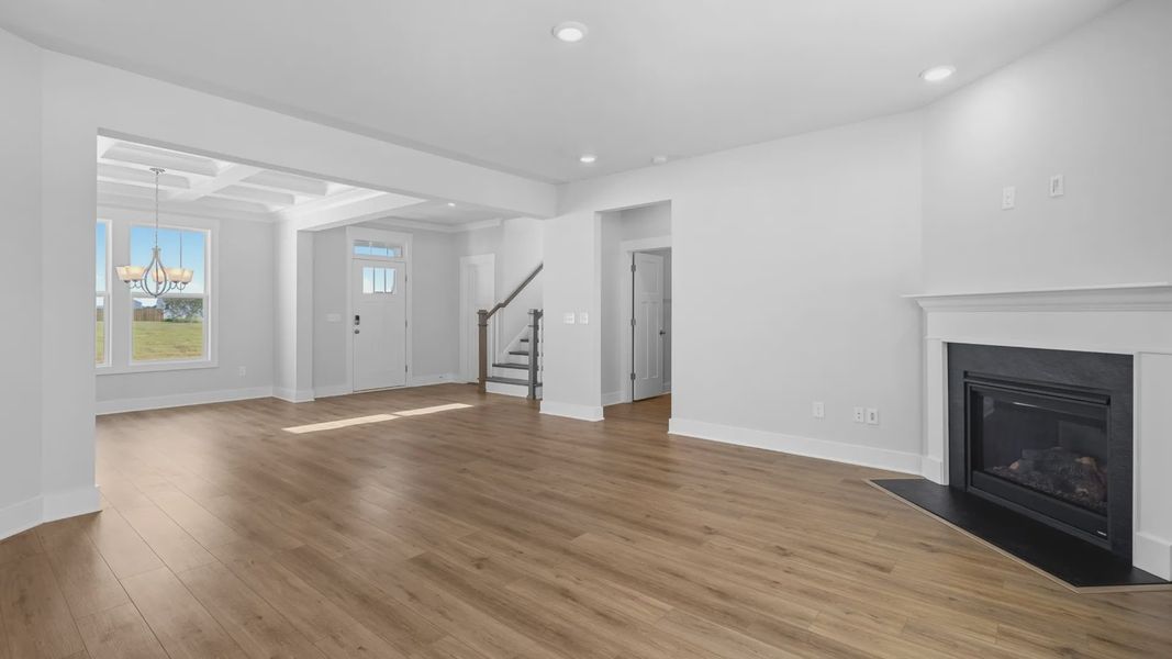 2 story single family home, all white, family room